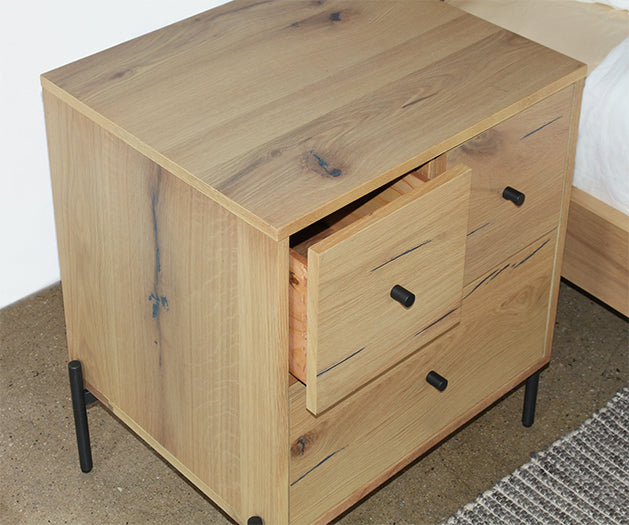 Light Oak Three Drawer Nightstand With Gunmetal HW