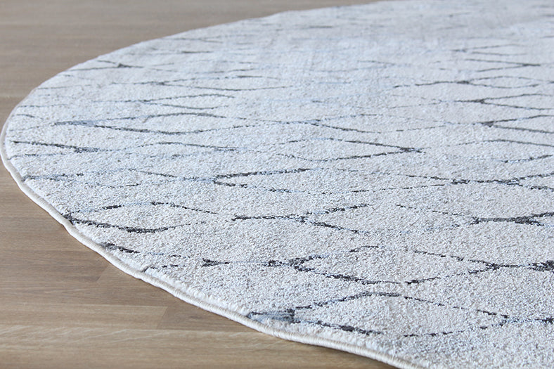 8'9" Round Ivory And Beige Diamond Rug